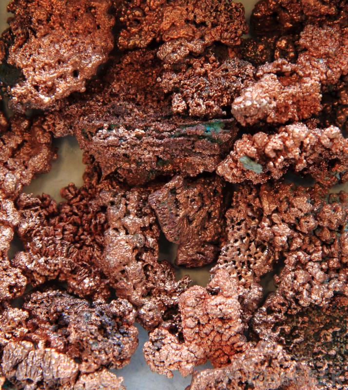 Ores of metals like copper are mined and consumed by industry in amounts that total millions of tons worldwide each year.